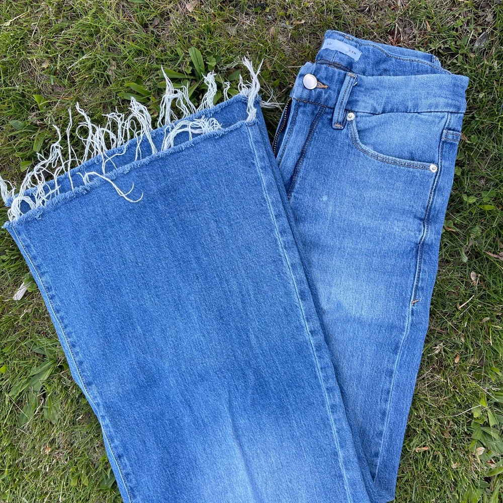 Good American Blue Flare Jeans with Frayed Hem